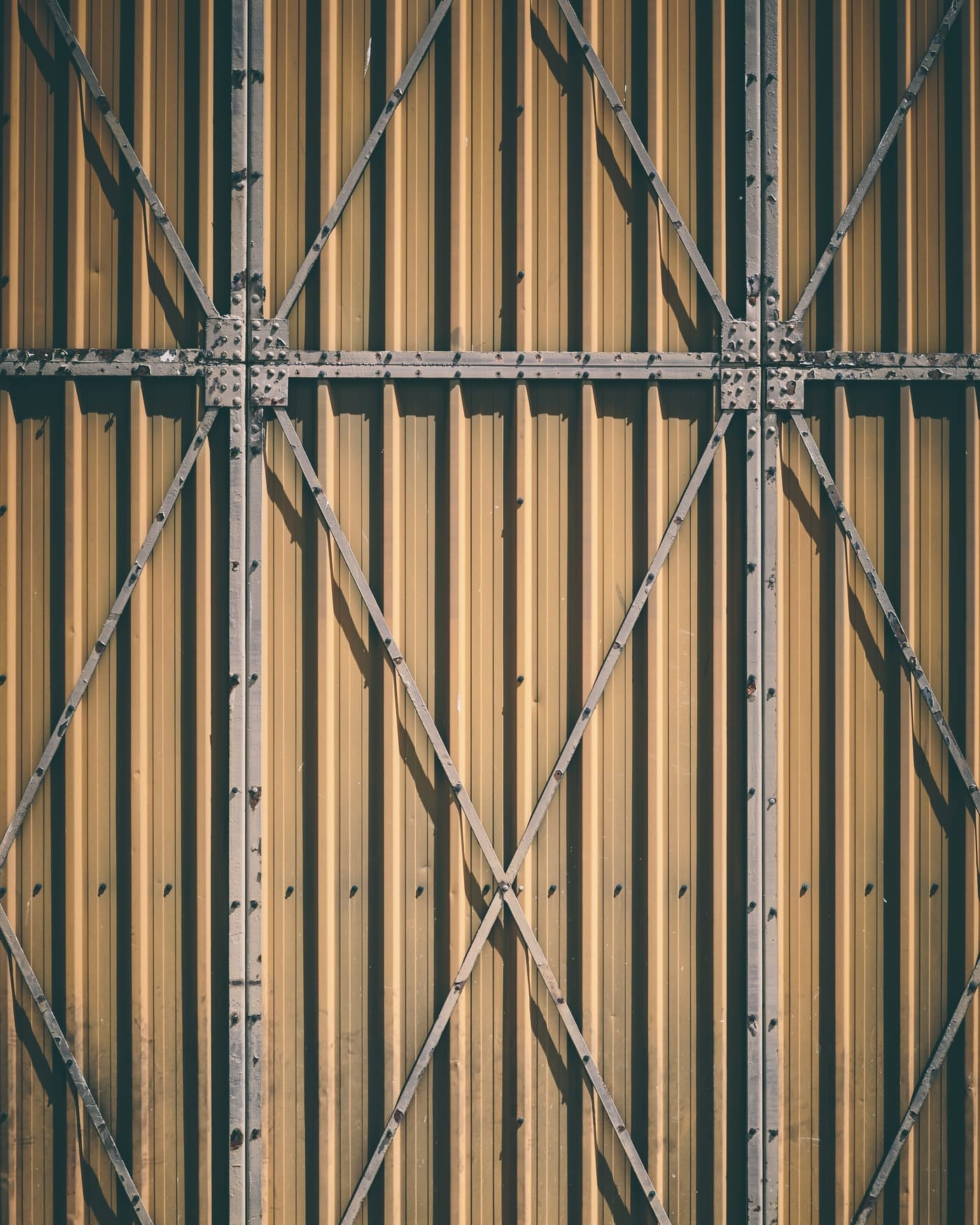 Heavy riveted industrial steel door, closed