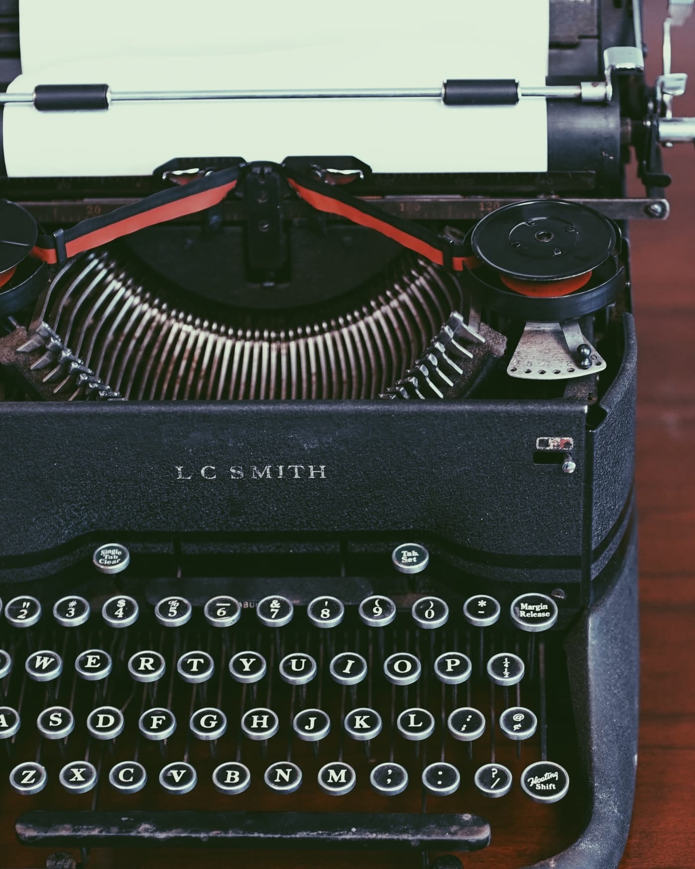 Close-up of the round keys of an antique L.C. Smith typewriter