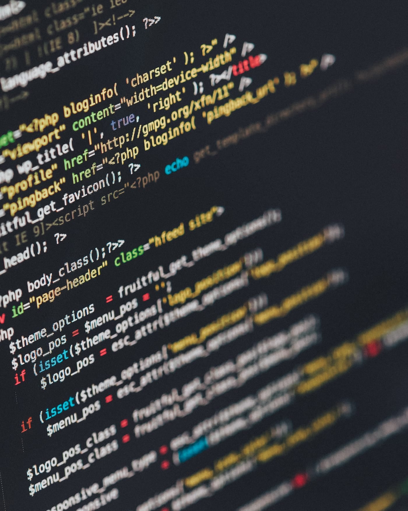 Close-up of colorful PHP source code on a dark computer screen