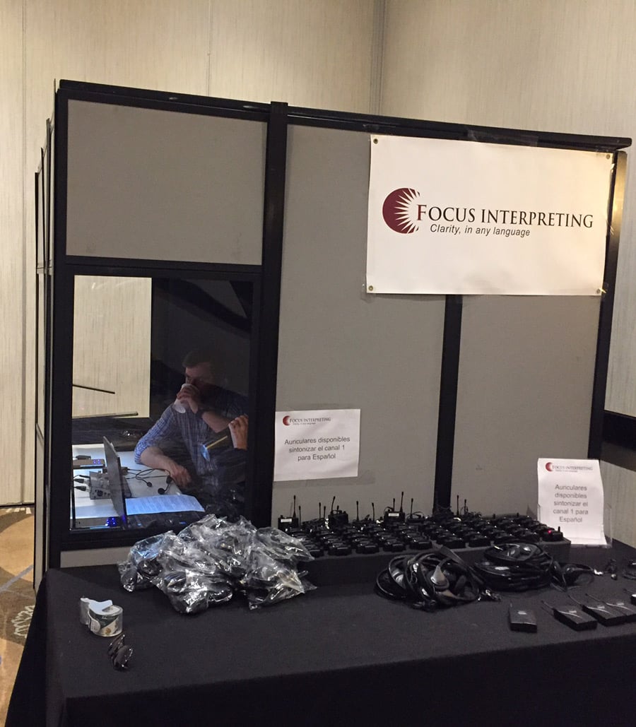 Interpreting booth at a conference staffed by Focus Interpreting